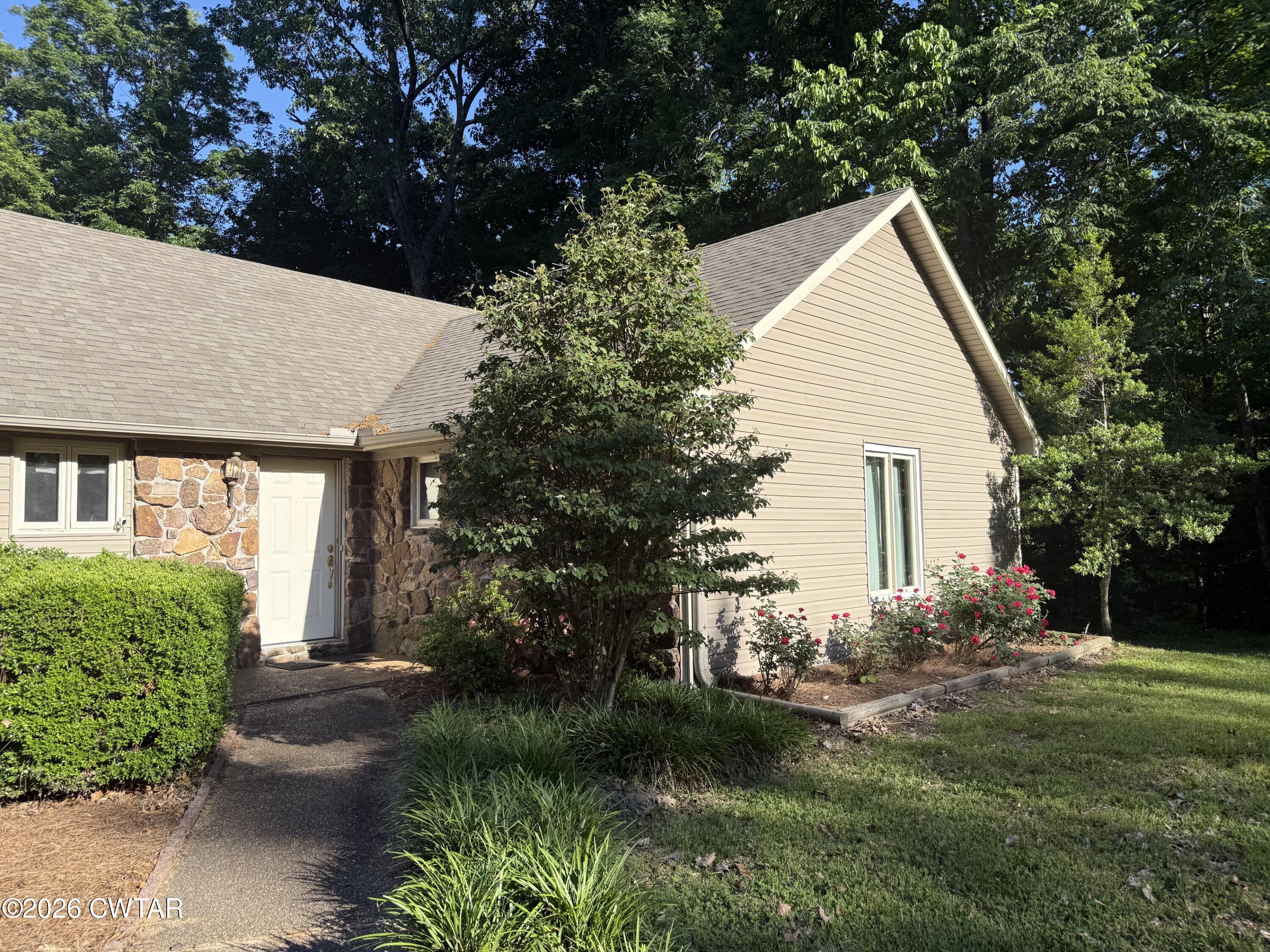 930 Oak Ridge Road Dyersburg, TN 38024 - Photo 13 of 59 a view of a house with a yard