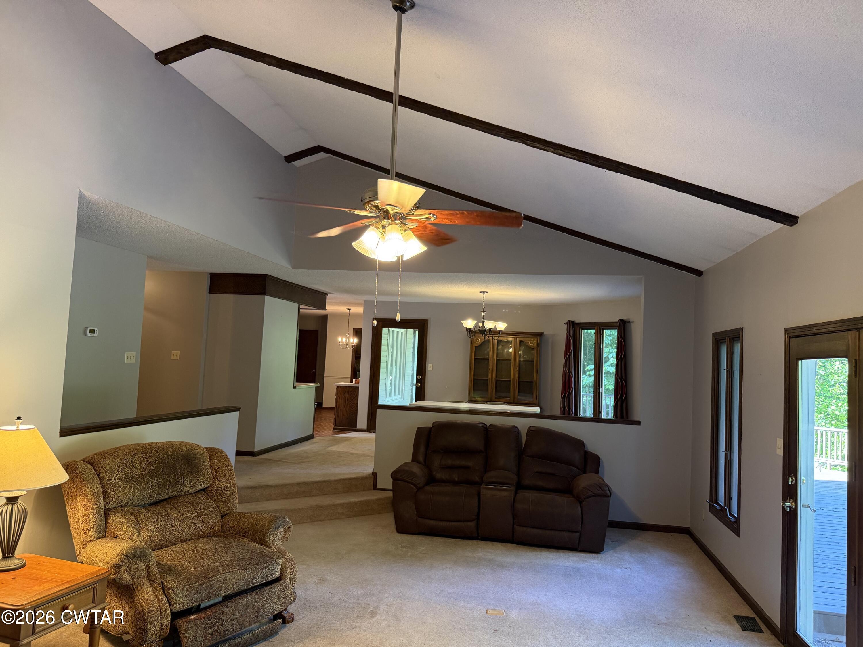 930 Oak Ridge Road Dyersburg, TN 38024 - Photo 14 of 59 a living room with furniture and a large mirror