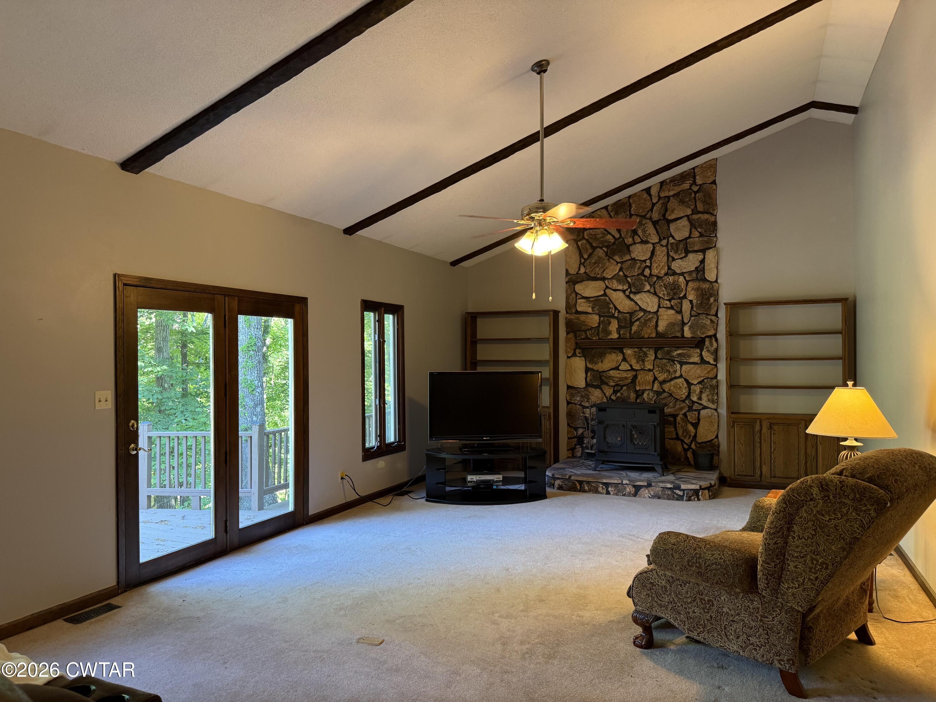 930 Oak Ridge Road Dyersburg, TN 38024 - Photo 15 of 59 a living room with furniture and a flat screen tv
