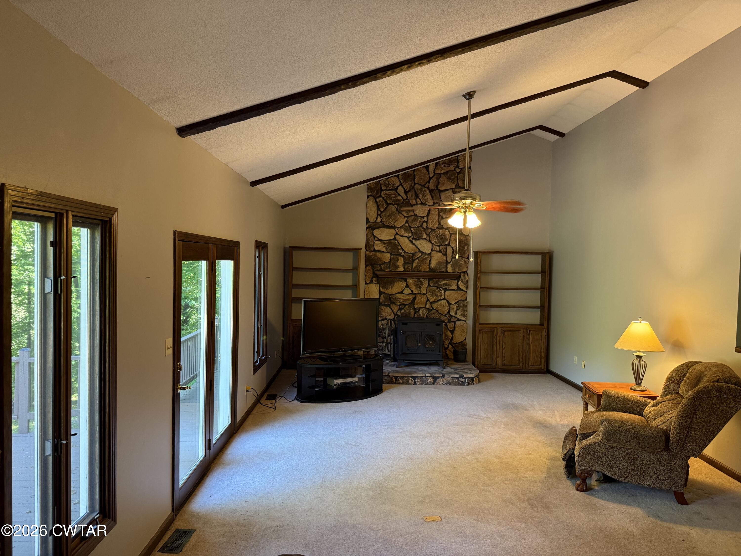 930 Oak Ridge Road Dyersburg, TN 38024 - Photo 18 of 59 a view of a livingroom with furniture and a ceiling fan