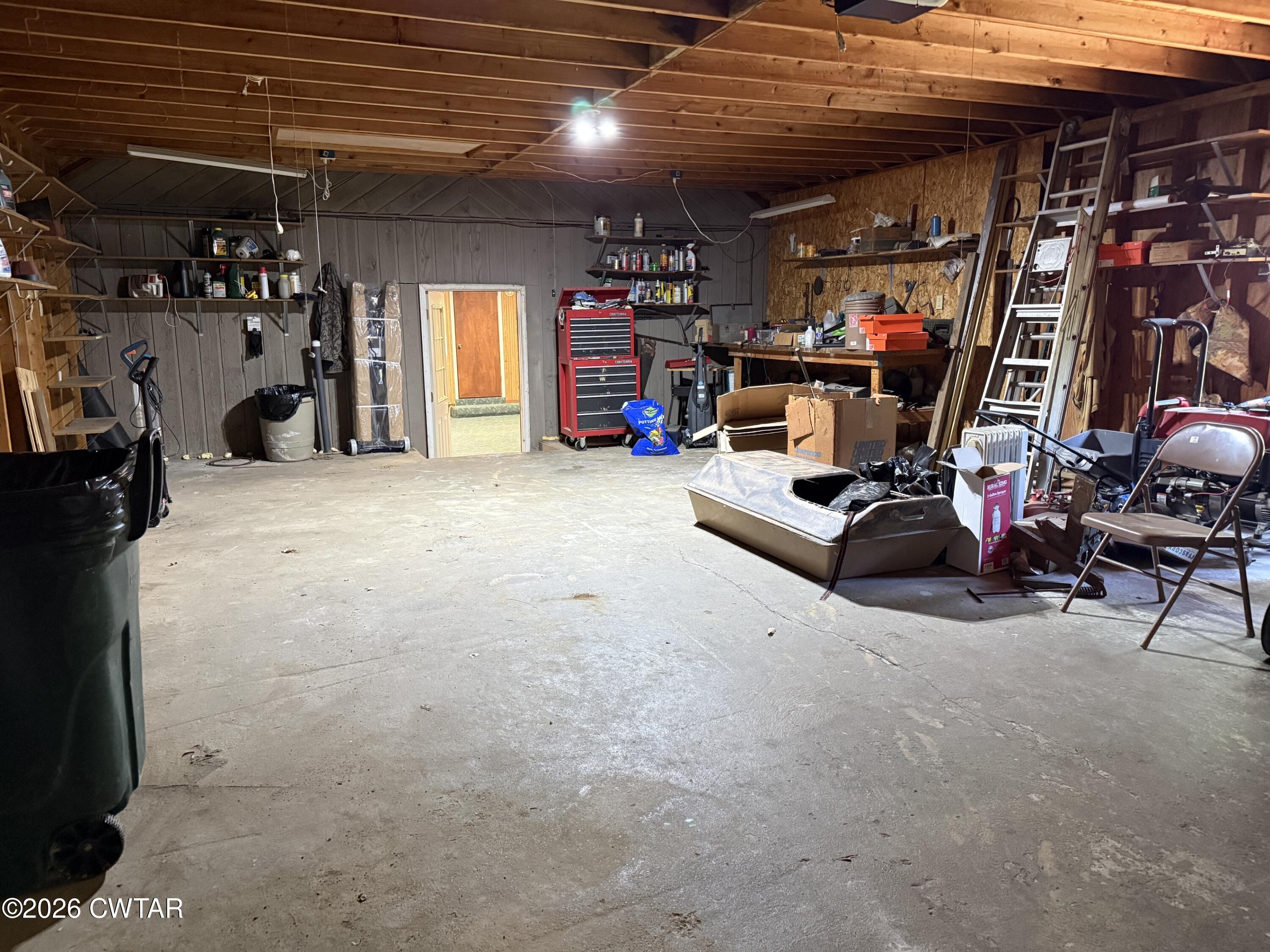 930 Oak Ridge Road Dyersburg, TN 38024 - Photo 44 of 59 a view of a storage room with gym equipment