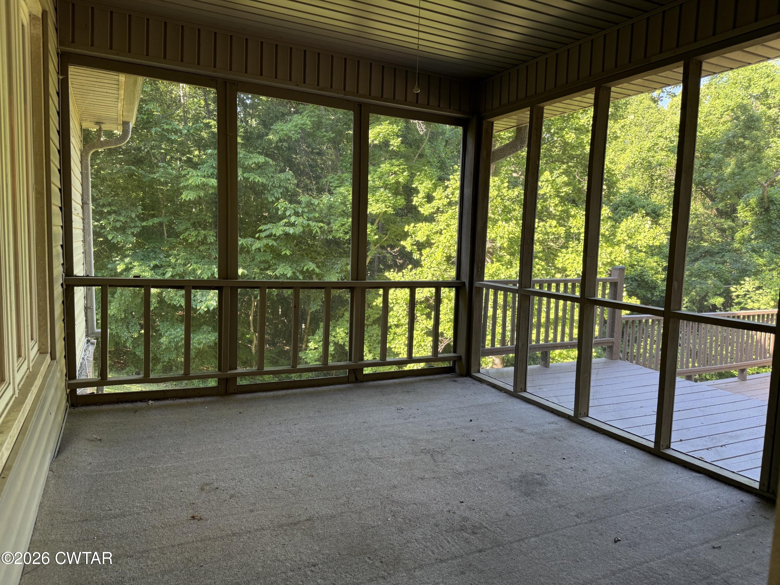 930 Oak Ridge Road Dyersburg, TN 38024 - Photo 47 of 59 a view of an empty room with a large window