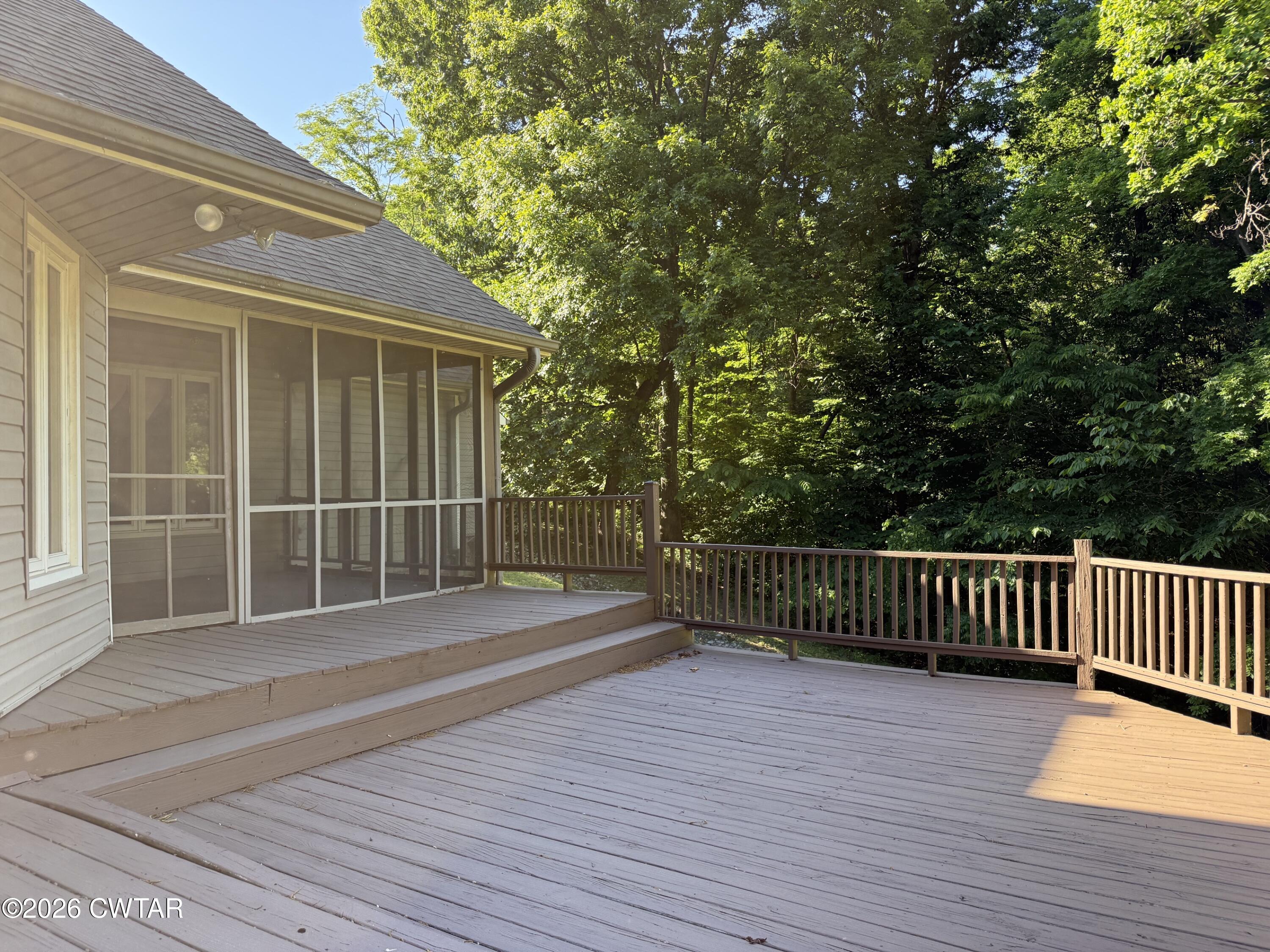 930 Oak Ridge Road Dyersburg, TN 38024 - Photo 49 of 59 a view of backyard with deck and wooden floor