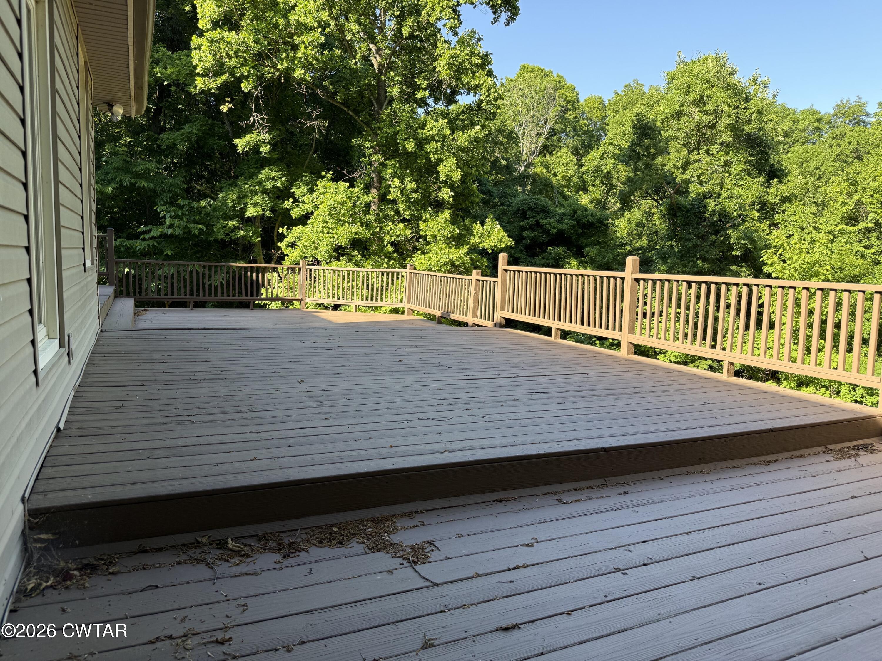 930 Oak Ridge Road Dyersburg, TN 38024 - Photo 50 of 59 a view of a wooden deck