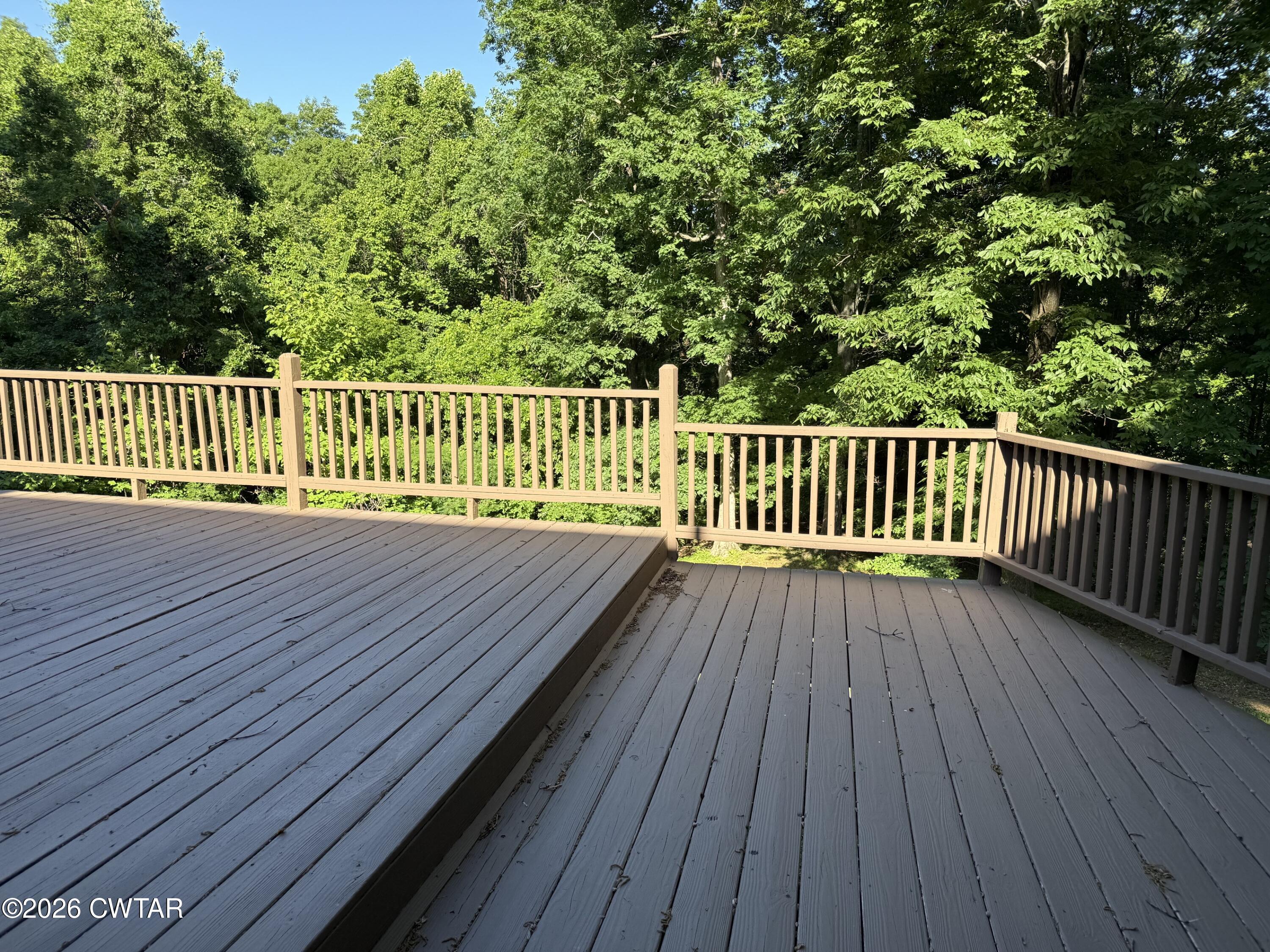930 Oak Ridge Road Dyersburg, TN 38024 - Photo 51 of 59 a balcony with view of a wooden floor