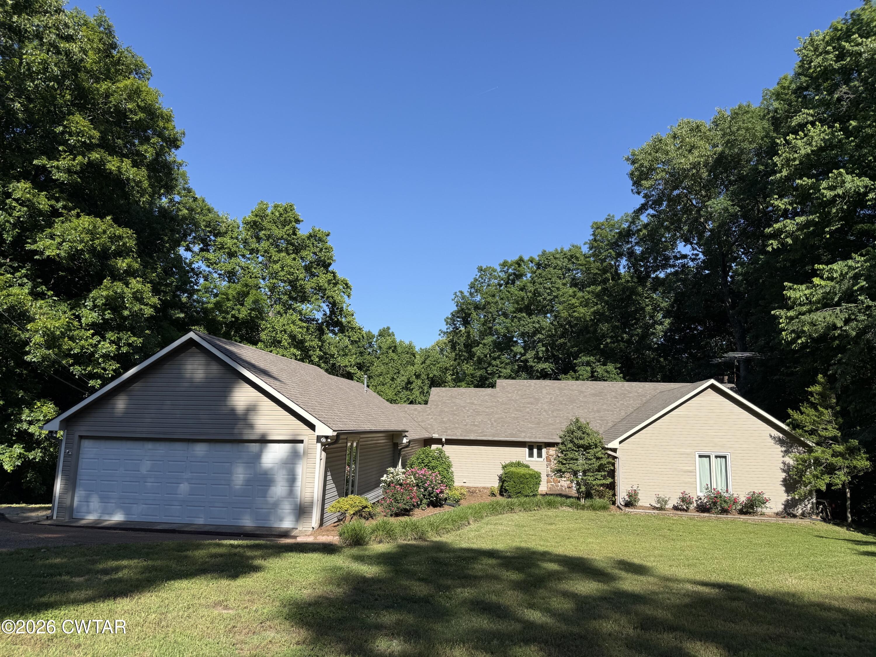 930 Oak Ridge Road Dyersburg, TN 38024 - Photo 58 of 59 a view of a yard in front view of a house