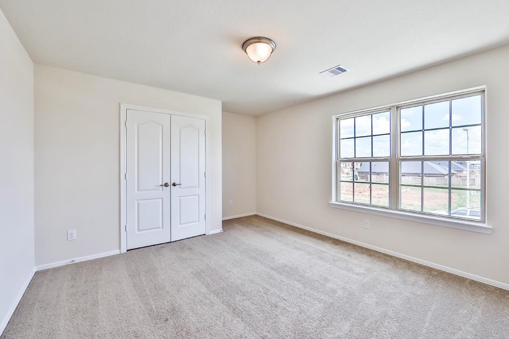 247 Sintra Lk Way Rosenberg, TX 77469 - Photo 26 of 28 a view of an empty room with a window