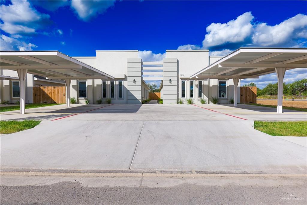 a view of a building with a street