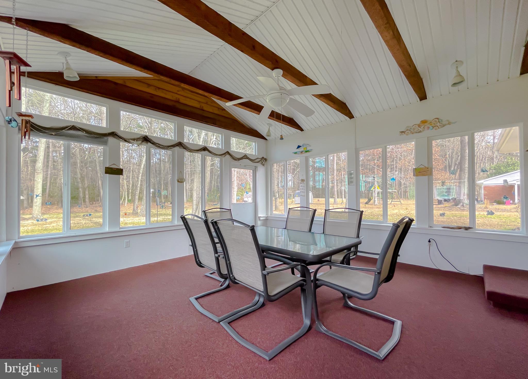 49078 Wynne Road Ridge, MD 20680 - Photo 37 of 57 Bright enclosed with scenic outdoor views.