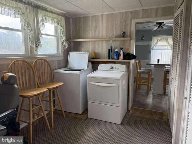 a storage room with washer and dryer