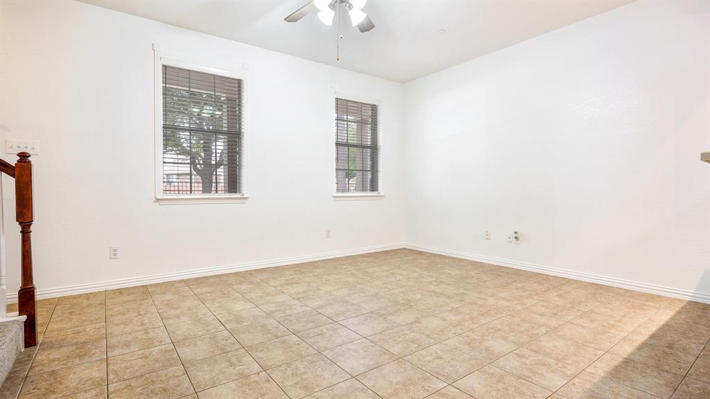 3206 Bedford Road Bedford, TX 76021 - Photo 9 of 26 an empty room with windows