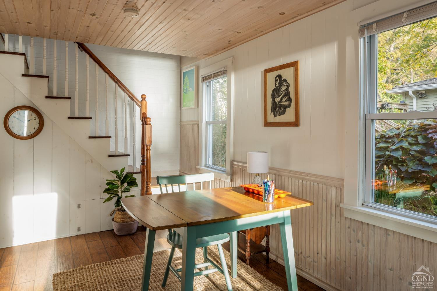 445 Lakeview Road Craryville, NY 12521 - Photo 29 of 45 a view of a dining room with furniture and wooden floor