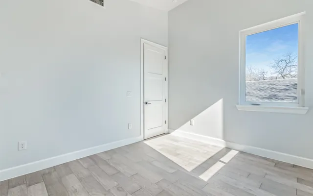 an empty room with an entryway