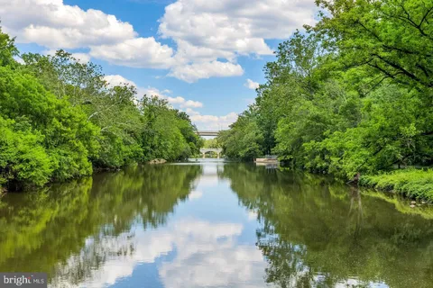 a view of a lake with a yard