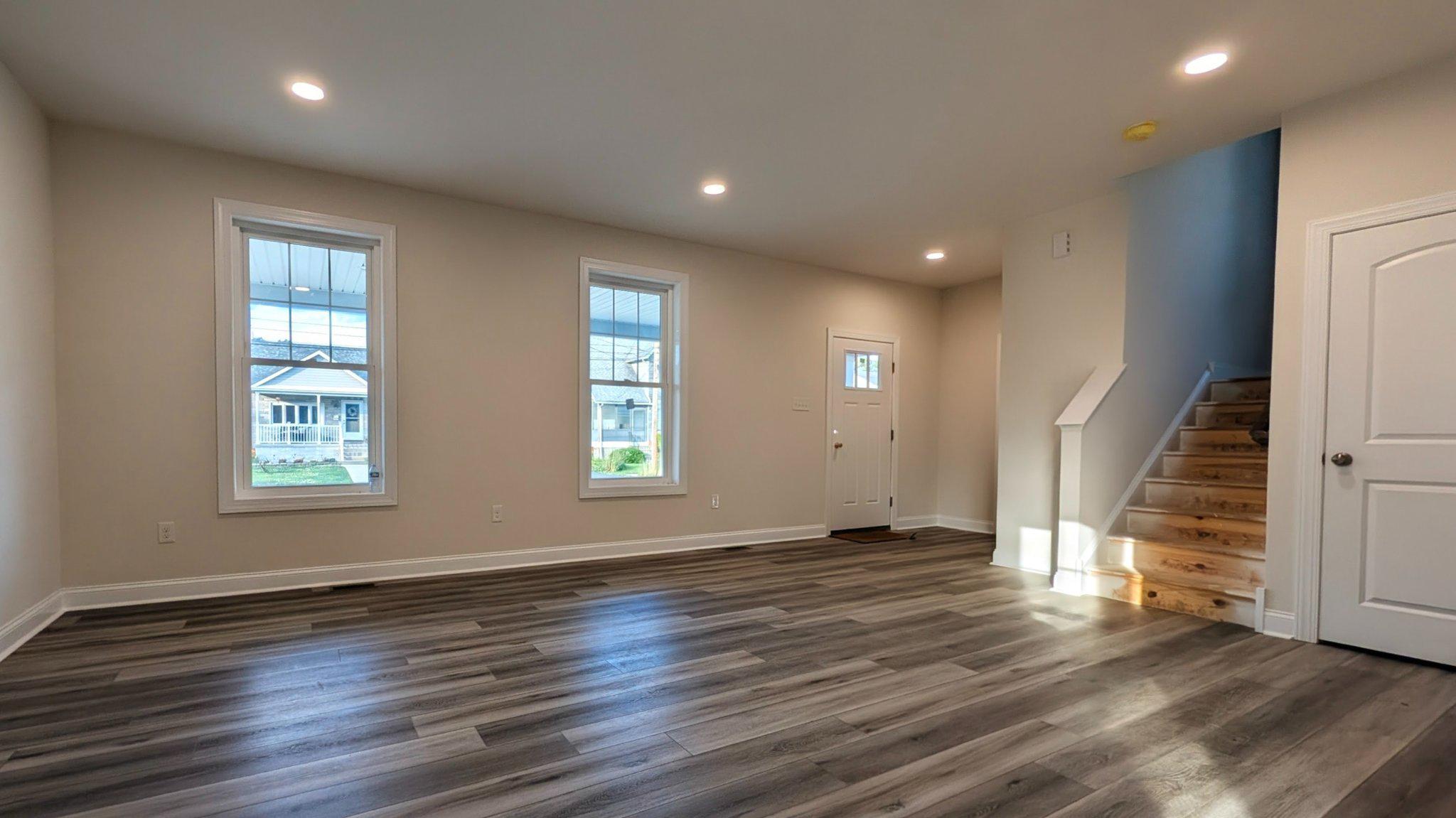425 Rutledge Avenue Folsom, PA 19033 - Photo 8 of 33 Luxury vinyl plank floors thru out the 1st floor.