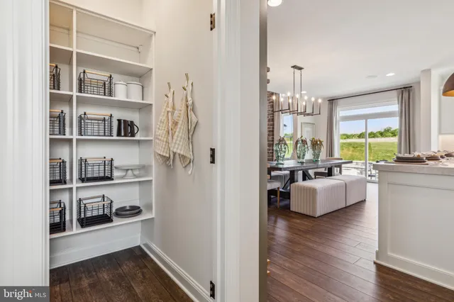 a view of living room with furniture and window