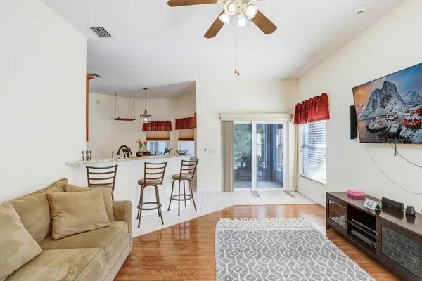 a living room with furniture and a rug