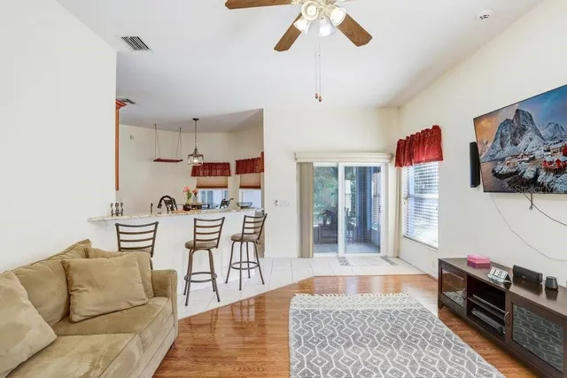 a living room with furniture and a rug