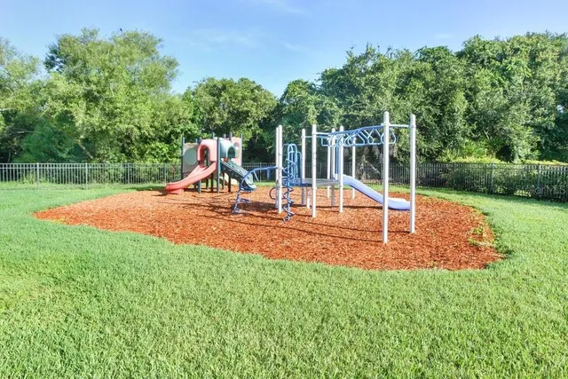 a view of a park with slide