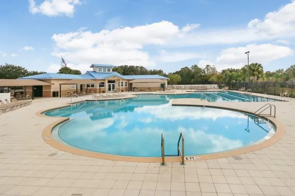 a view of a swimming pool and a terrace