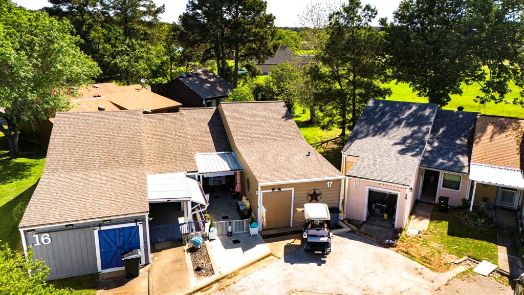 17 Townhouse Lane Trinity, TX 75862 - Photo 7 of 26 an aerial view of a house with swimming pool and porch