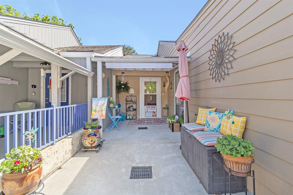 17 Townhouse Lane Trinity, TX 75862 - Photo 8 of 26 a front view of a house with outdoor seating