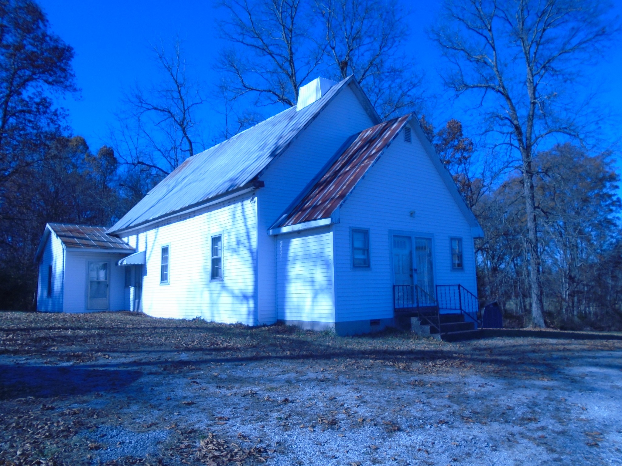 293 Mud Creek Road Morrison, TN 37357 - Photo 1 of 3 a view of a house with a backyard