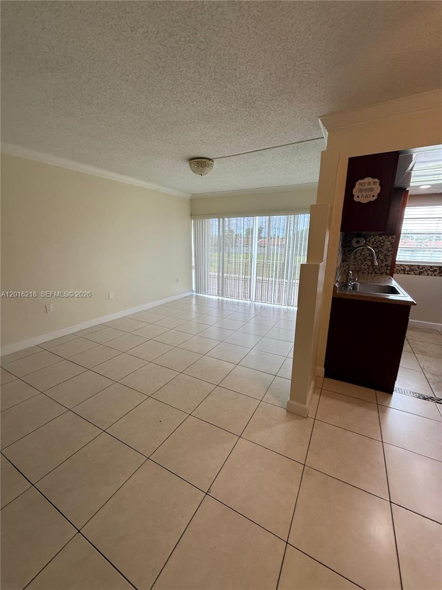 9321 Southwest 4th Street, Unit 230C Miami, FL 33174 - Photo 14 of 37 a view of a livingroom with furniture