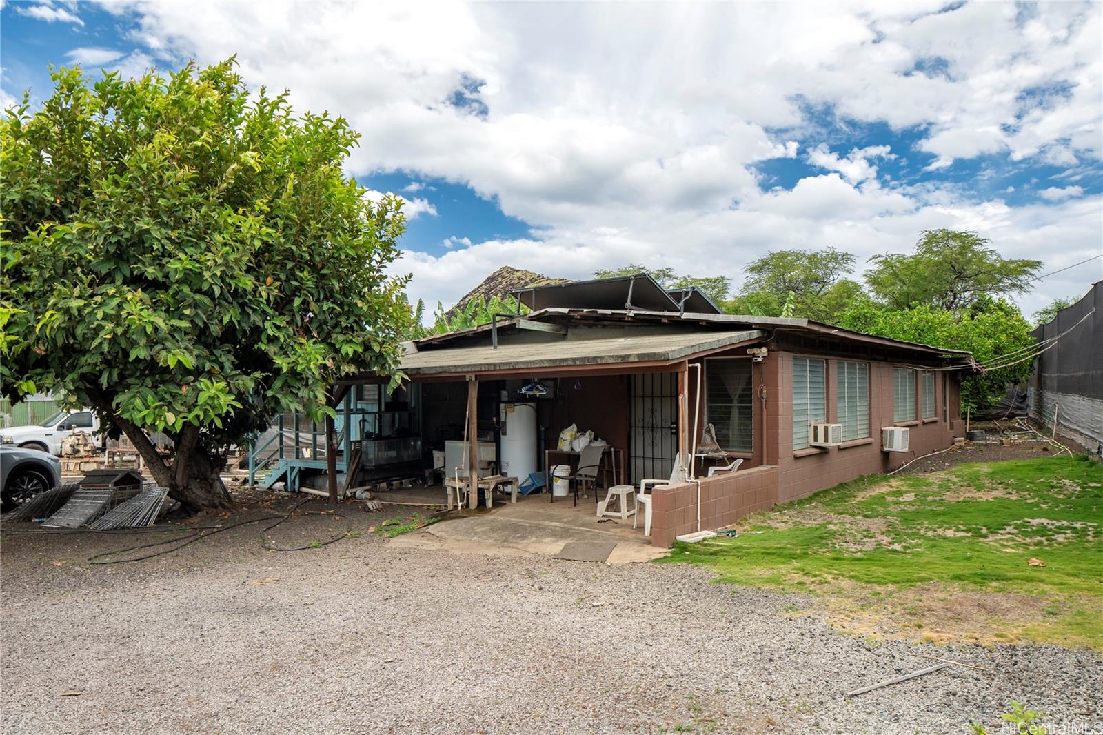 86-347 Halona Road Waianae, HI 96792 - Photo 13 of 22 a view of a car park in front of a house