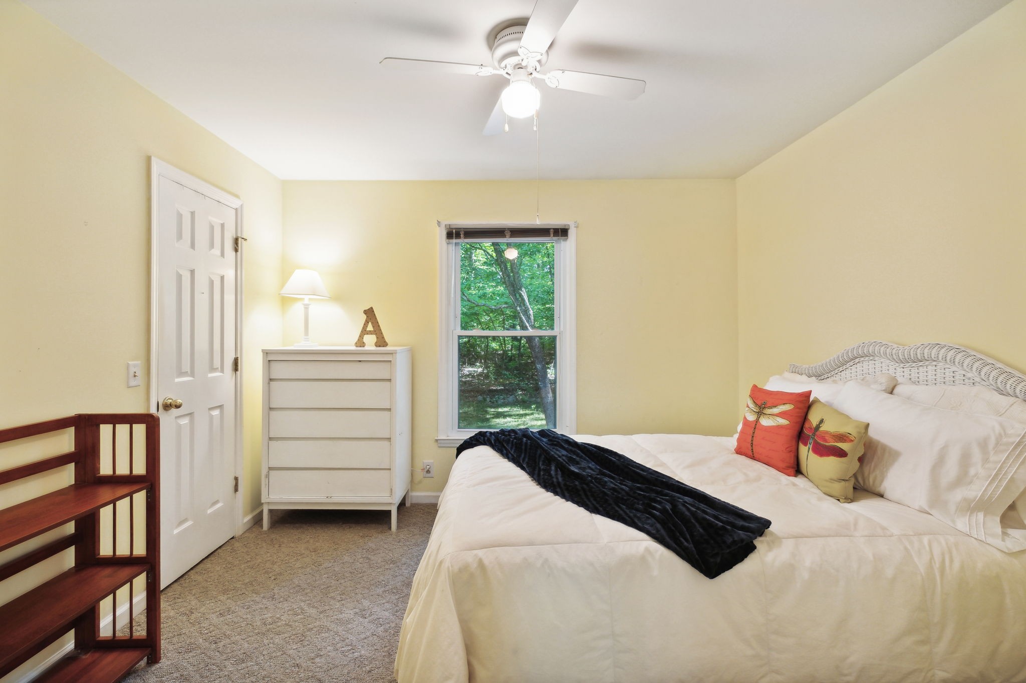 7126 Harding Drive Northwest Fairview, TN 37062 - Photo 11 of 22 a bedroom with a bed and a chandelier