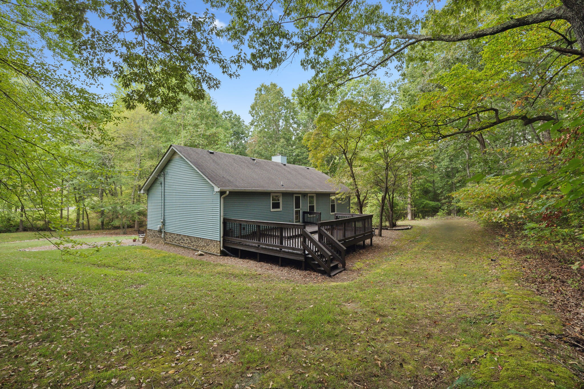 7126 Harding Drive Northwest Fairview, TN 37062 - Photo 16 of 22 a view of a house with a yard and sitting area