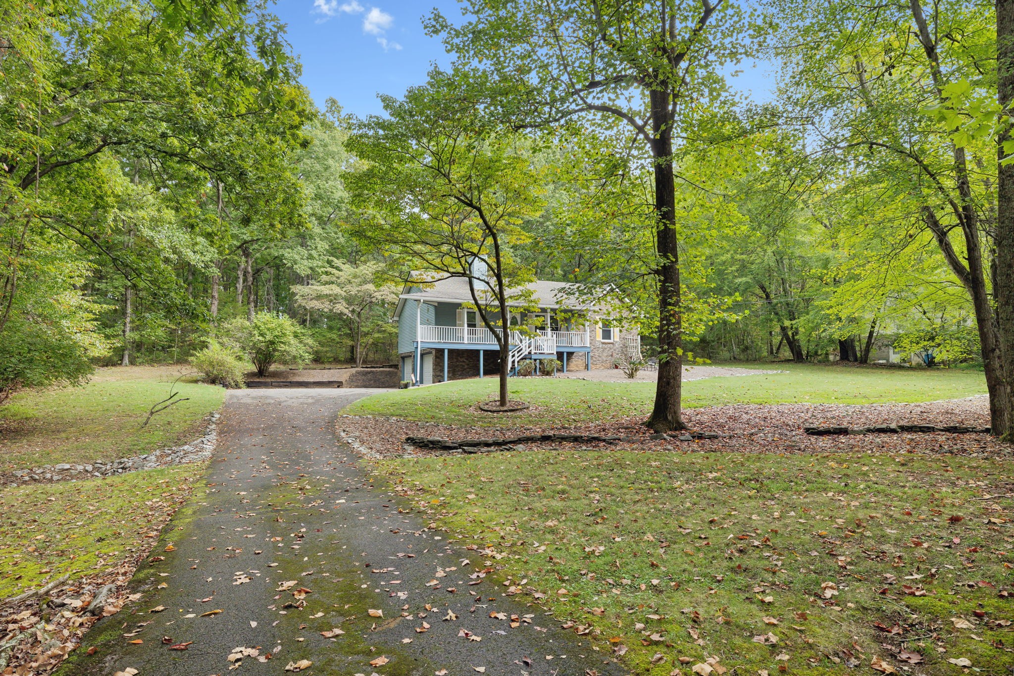 7126 Harding Drive Northwest Fairview, TN 37062 - Photo 18 of 22 a view of a house with a yard