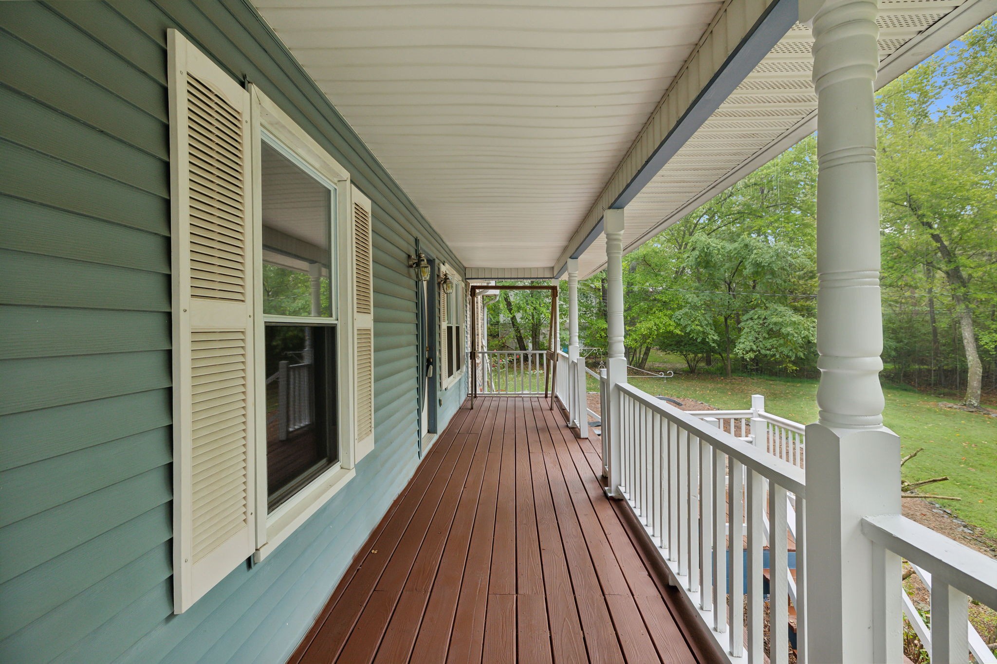 7126 Harding Drive Northwest Fairview, TN 37062 - Photo 2 of 22 a view of a balcony with wooden floor