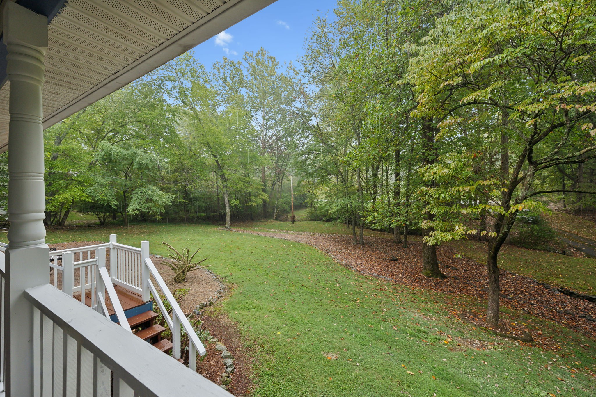 7126 Harding Drive Northwest Fairview, TN 37062 - Photo 3 of 22 a view of a backyard with sitting area