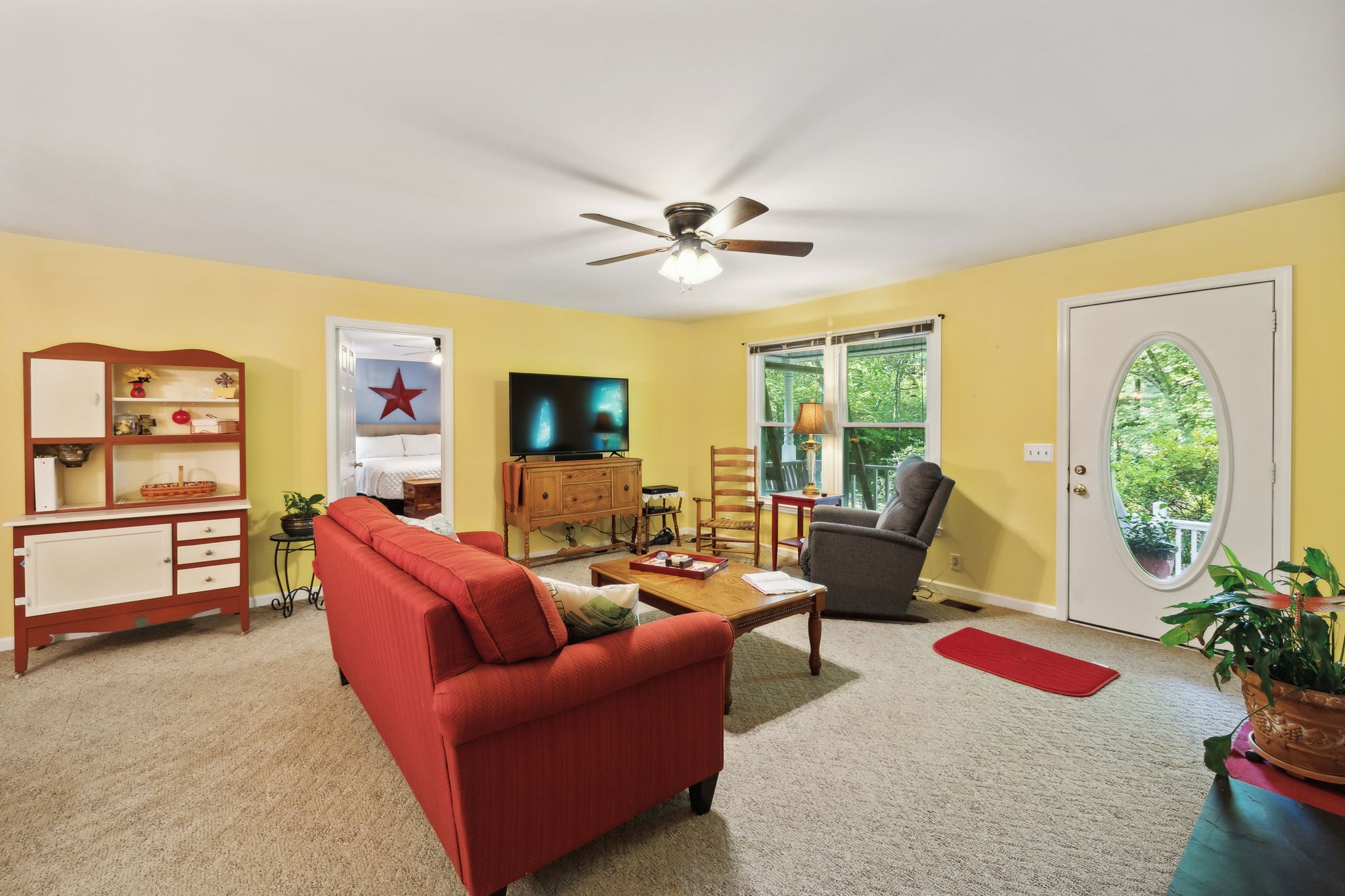 7126 Harding Drive Northwest Fairview, TN 37062 - Photo 4 of 22 a living room with furniture and a flat screen tv
