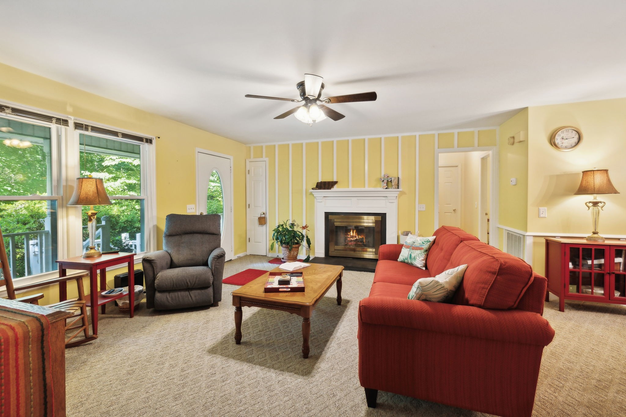 7126 Harding Drive Northwest Fairview, TN 37062 - Photo 5 of 22 a living room with furniture a fireplace and a large window