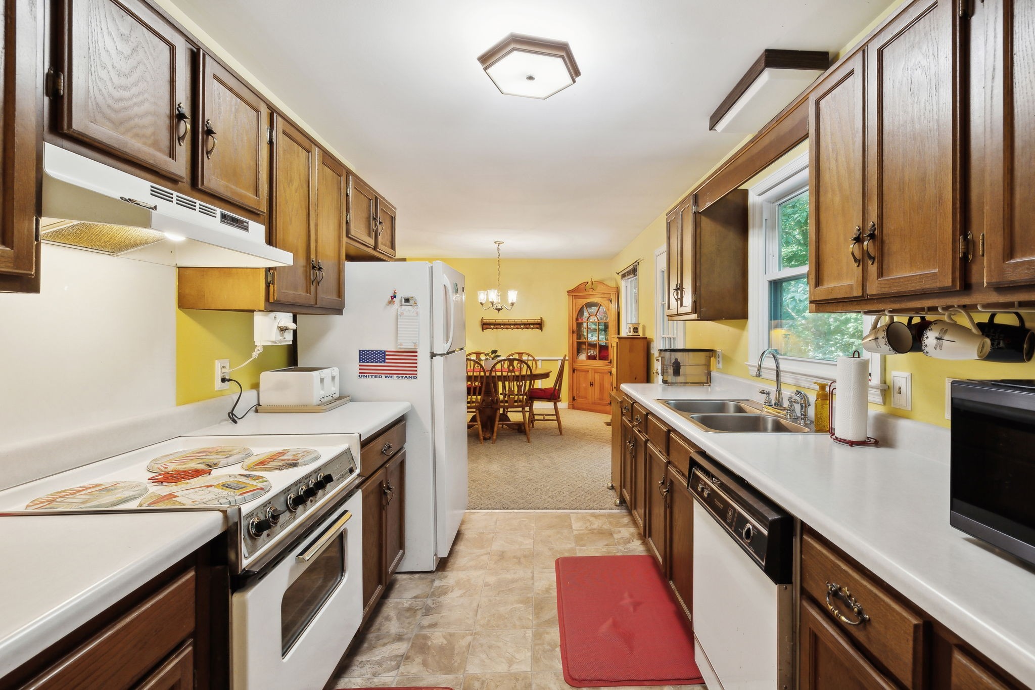 7126 Harding Drive Northwest Fairview, TN 37062 - Photo 7 of 22 a kitchen with a sink stove and cabinets