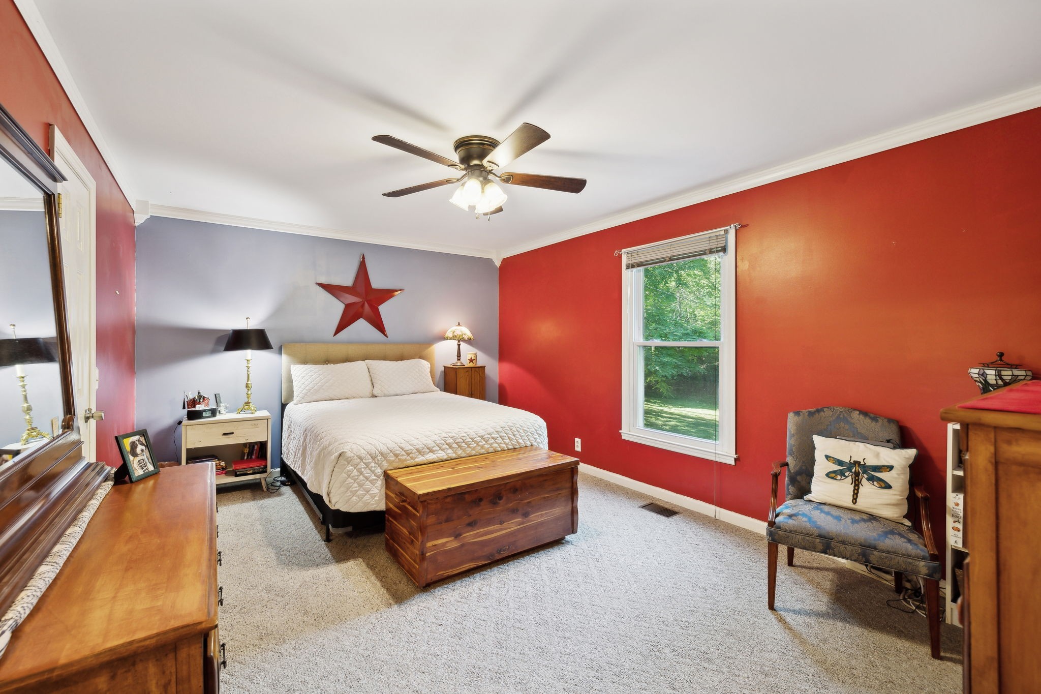 7126 Harding Drive Northwest Fairview, TN 37062 - Photo 9 of 22 a spacious bedroom with a bed a table and chair