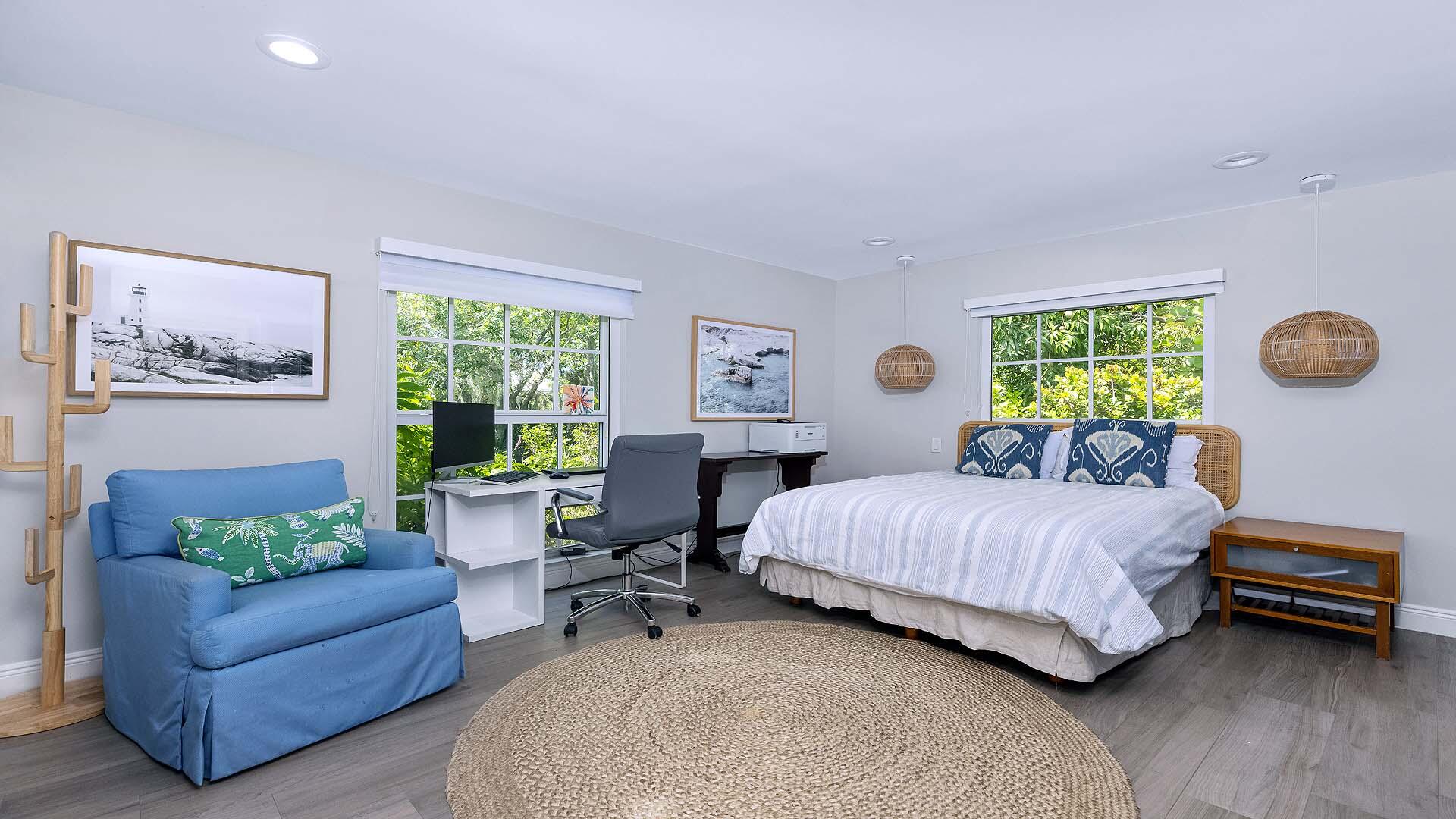 335 Old School Road Gulf Stream, FL 33483 - Photo 22 of 29 a bedroom with a bed and a couch