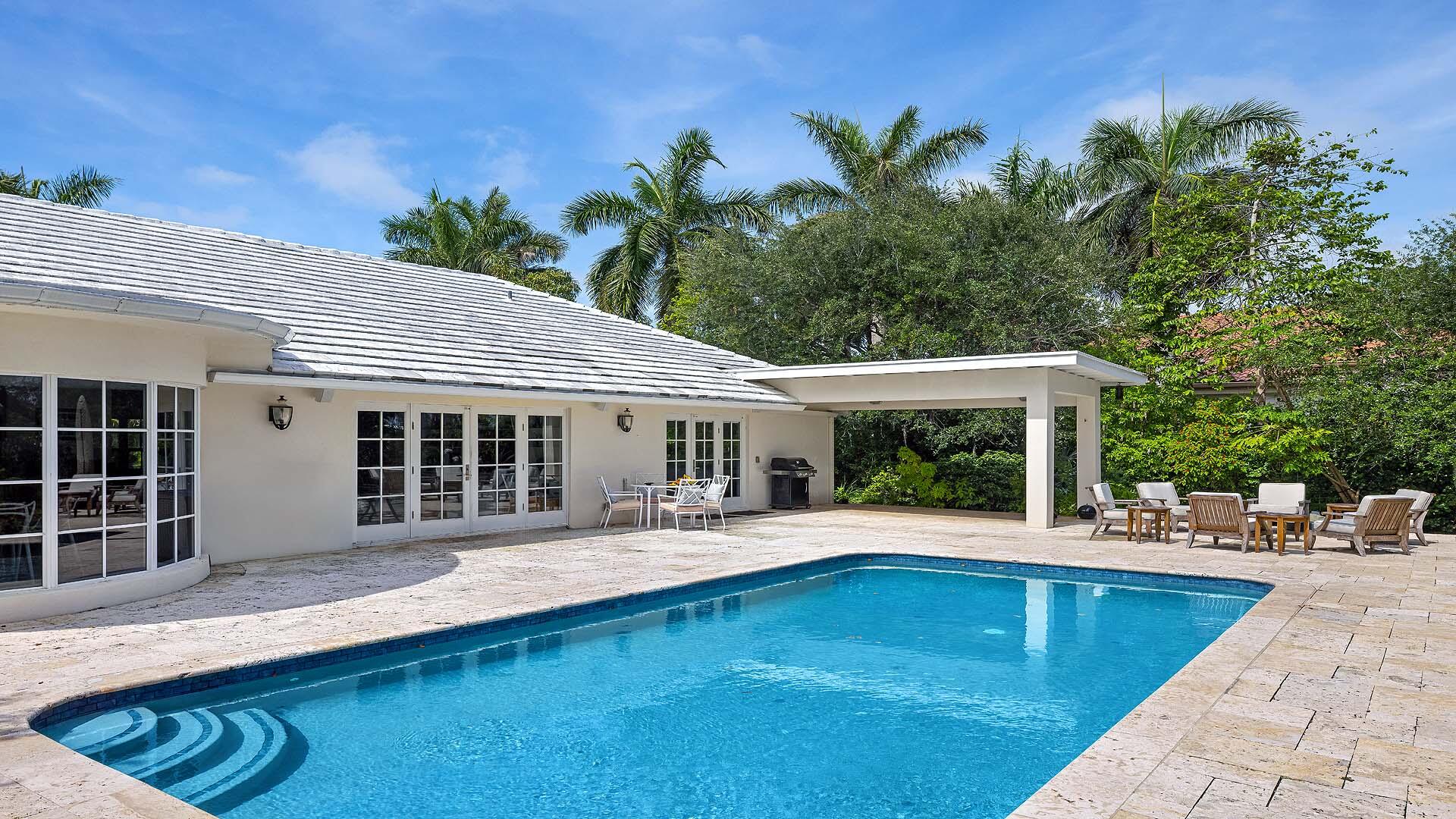335 Old School Road Gulf Stream, FL 33483 - Photo 27 of 29 a house view with a sitting space and garden