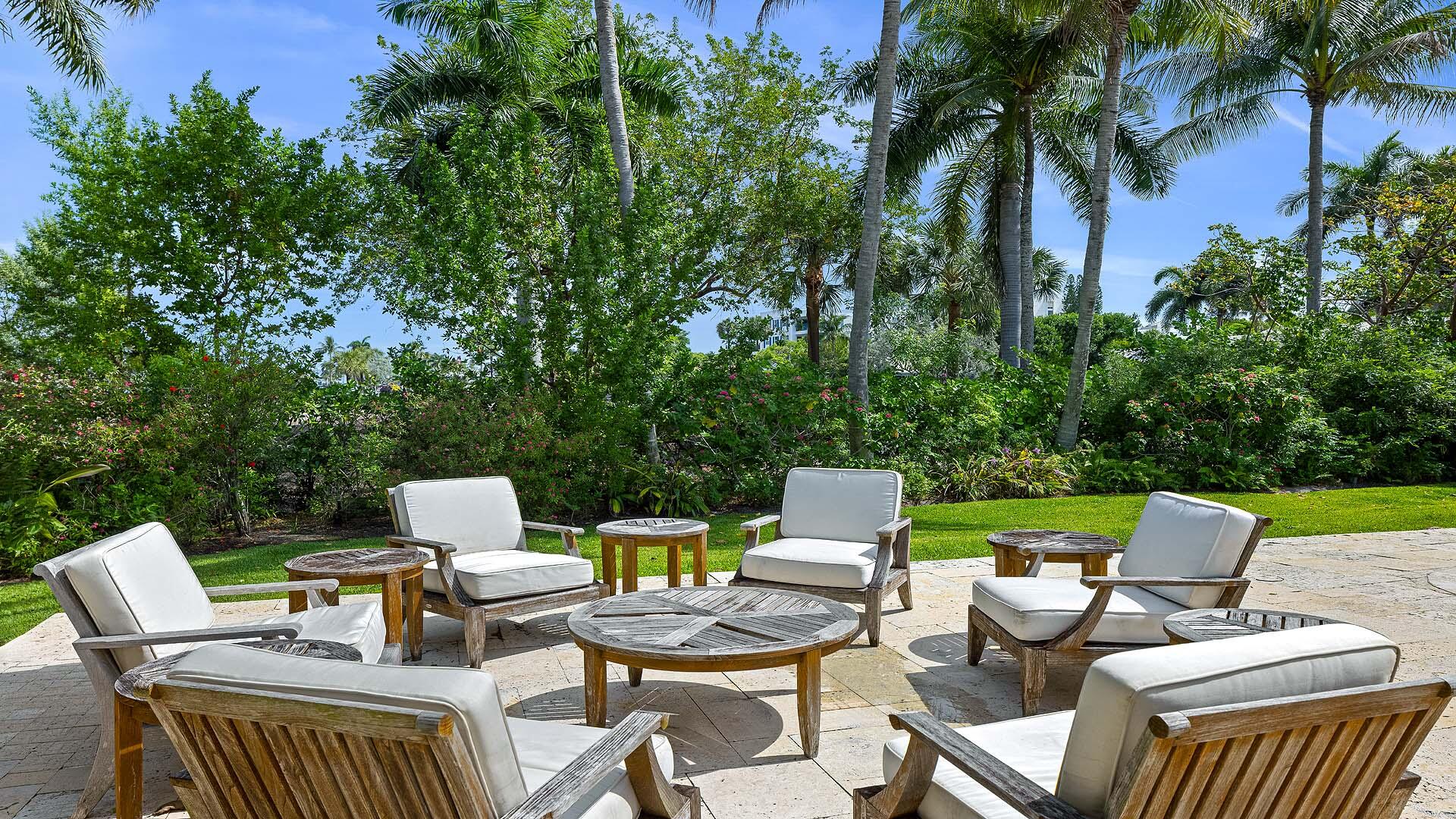 335 Old School Road Gulf Stream, FL 33483 - Photo 29 of 29 a view of a patio with furniture