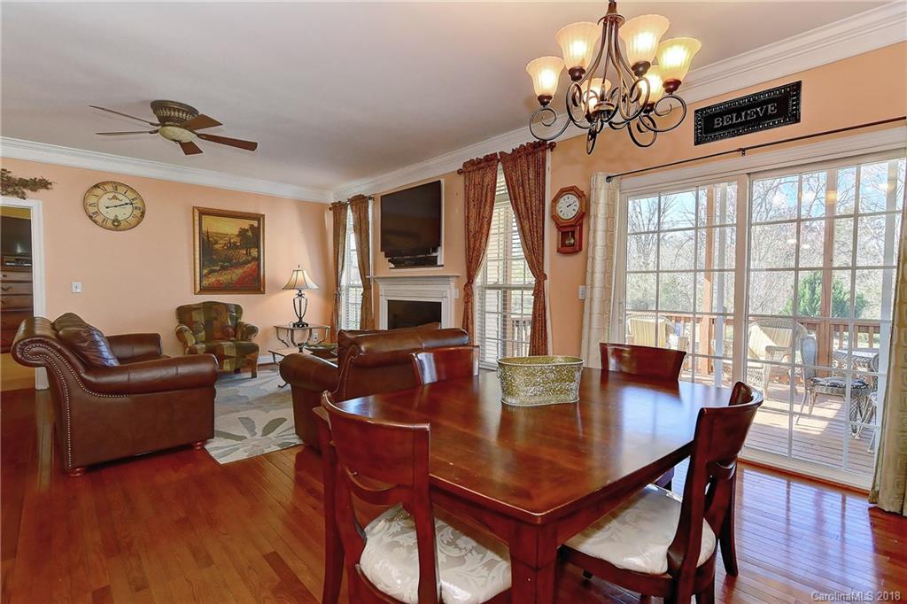 4172 Sunset Ridge Drive Rock Hill, SC 29732 - Photo 12 of 35 a view of a dining room with furniture window and wooden floor