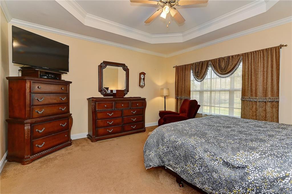 4172 Sunset Ridge Drive Rock Hill, SC 29732 - Photo 17 of 35 a bedroom with a bed and a television