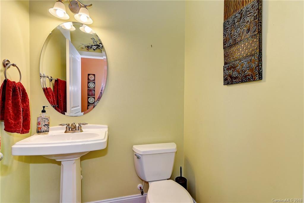 4172 Sunset Ridge Drive Rock Hill, SC 29732 - Photo 21 of 35 a bathroom with a toilet sink and mirror