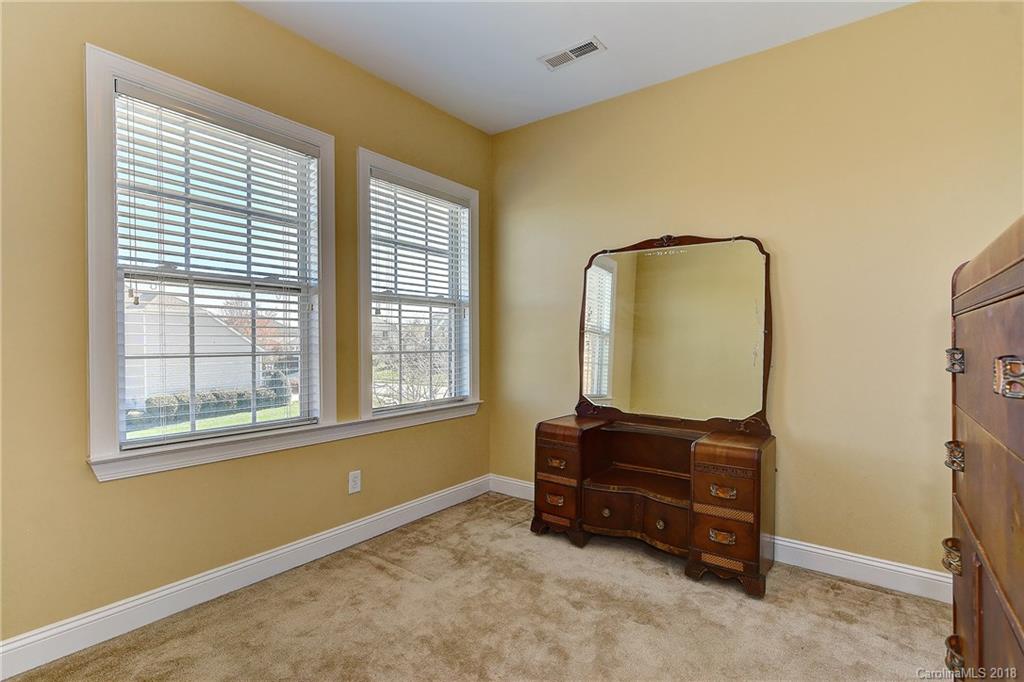 4172 Sunset Ridge Drive Rock Hill, SC 29732 - Photo 24 of 35 a room with a dresser next to a window