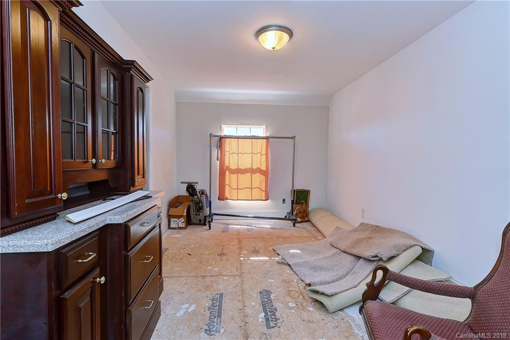 4172 Sunset Ridge Drive Rock Hill, SC 29732 - Photo 25 of 35 a spacious bedroom with a bed and a table in it