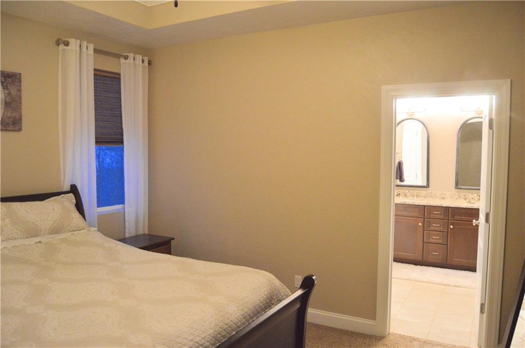 2169 Lovi Road Freedom, PA 15042 - Photo 13 of 25 a bedroom with a bed and wooden floor