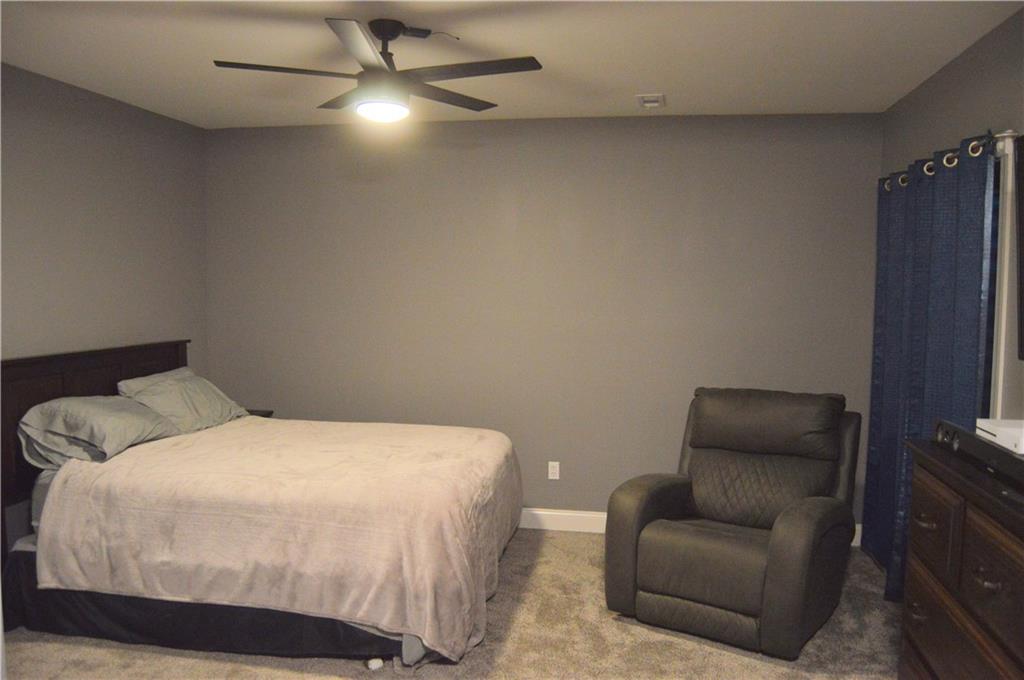 2169 Lovi Road Freedom, PA 15042 - Photo 19 of 25 a bedroom with a bed and a television