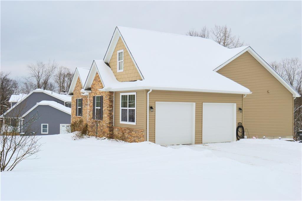 2169 Lovi Road Freedom, PA 15042 - Photo 2 of 25 a view of a house with a yard and garage