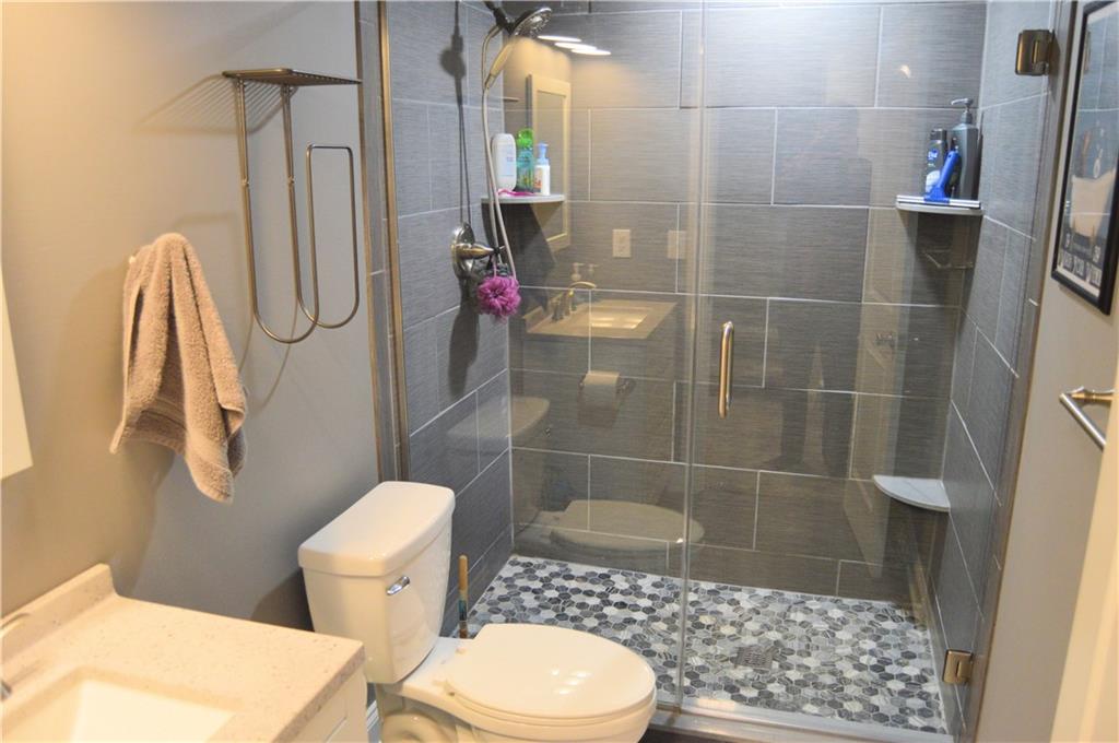 2169 Lovi Road Freedom, PA 15042 - Photo 21 of 25 a bathroom with a toilet and a shower